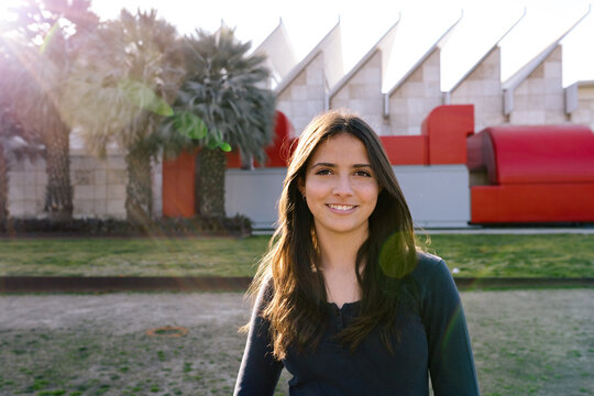 Teen Girl Smiles While Standing In Front Of LACMA