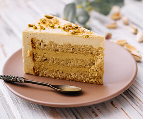 Vegan cake with matcha and pistachio