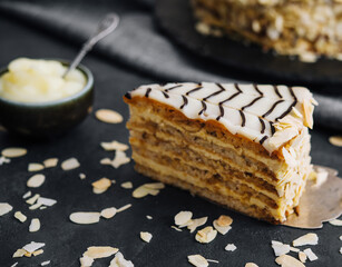 Sweet dessert slice of honey cake on a spatula