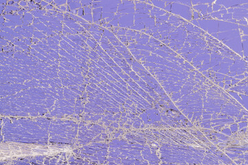 Dirty glass broken into a large number of pieces and parts