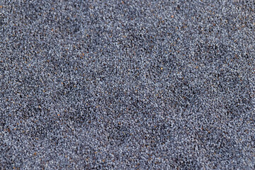 a close-up of a pile of poppy seeds used in cooking