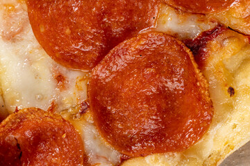 small homemade spicy pizza with sausage and cheese