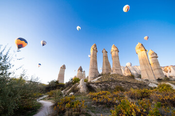 beautiful scenery flight of balloons in the mountains of Cappadocia in love valley