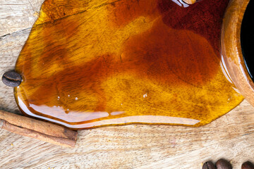 sweet natural bee honey spilled on the table