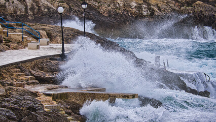 Promenade sea wave Malta
