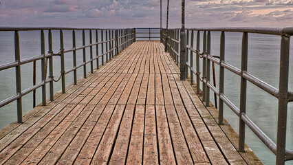 wooden bridge to the sea