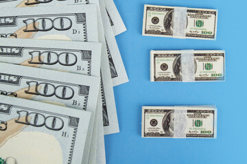 inflation in the USA, dollar bills and small bundles of money nearby, a decrease in the cost of...