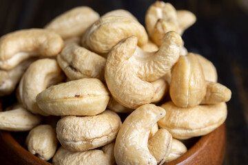 Fresh peeled cashew nuts on the table