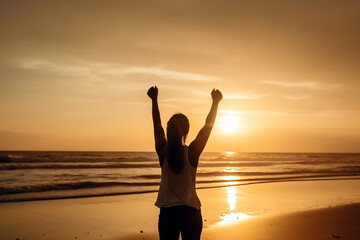 Fototapeta premium silhouette of a cheering hiking woman open arms at sunrise seaside. Fitness, business wallpaper or poster created with Generative AI