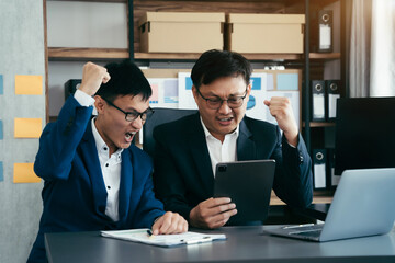 Happy smiling businessman feel happy work complete Teamwork success, success at work in the office concept.