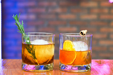 summer Fresh lemonade mocktails with crushed ice,   and divers oranges. Summer cold drink concept in luxury bar.