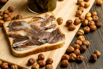 slices of bread with chocolate butter on the table