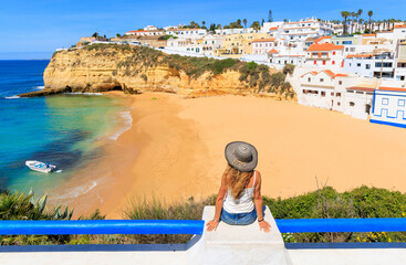 Fototapeta na wymiar Woman tourist travel in Portugal,, enjoying beautiful Algarve beach ( Carvoeiro)- summer holiday, vacation, travel concept