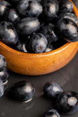 washed ripe black grapes covered with drops of water