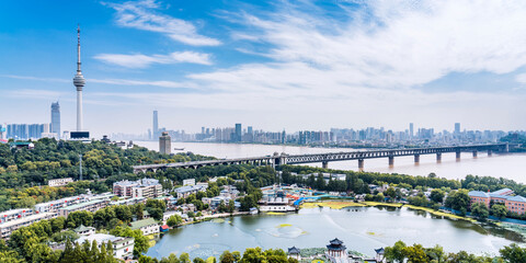 Obraz premium Scenery of Guishan TV Tower and Wuhan Yangtze River Bridge in Wuhan, Hubei, China