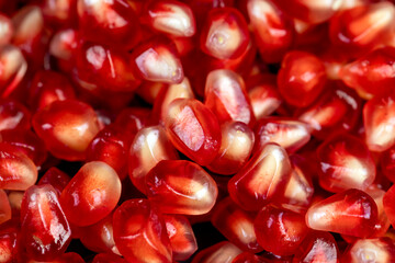 Red ripe pomegranate seeds with lots of juice