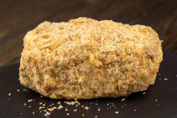 delicious piece of cake with puff pastry and sweet cream