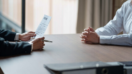 Successful job interview, Recruiter or manager and job candidate with resume in office..