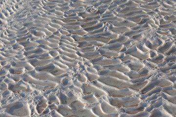 The texture of a carbonate mineral. Terraces in Pamukkale. Natural pools in Turkey