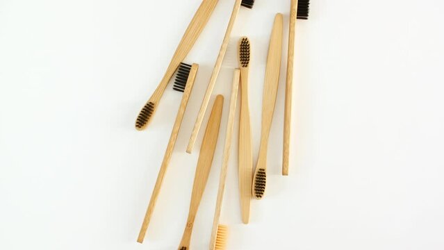 Eco-friendly biodegradable Bamboo toothbrush. No plastic. Conscious minimalism Vegan lifestyle. Reuse reduction concept. High quality 4k footage
