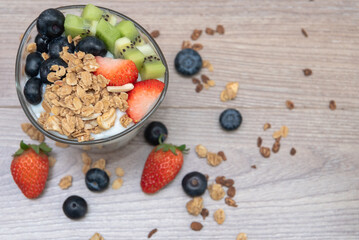 Homemade baked granola berry fruit yogurt