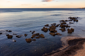 Seascape with rocks near the beach