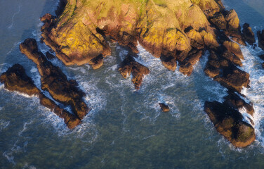 Coastal rocks viewed from above at sunrise