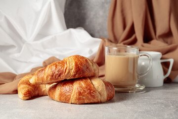 Croissants and coffee with cream.