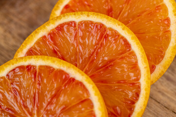 sliced orange with yellow-red juicy flesh