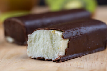 sweet green cottage cheese with kiwi flavor in chocolate glaze
