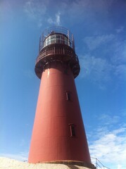 lighthouse on the coast - obrazy, fototapety, plakaty
