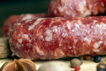 Dried veal sausage during slicing