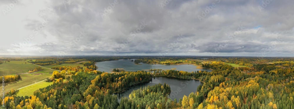 Sticker panorama view of a beautiful lake near the forest in voru, estonia