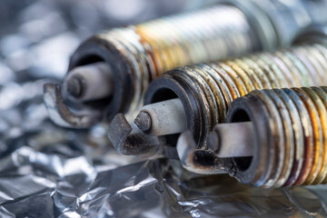 old very damaged car spark plugs