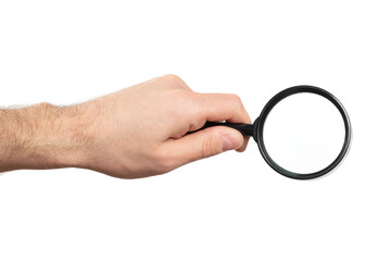 Man's hand, holding classic styled magnifying glass, closeup isolated on white background