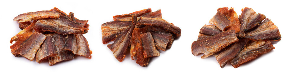 Pieces of cleaned dried fish isolated on white. Dry Peppered Pollack. Amber with pepper Collection