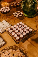 Wooden table with fresh tasty sweets