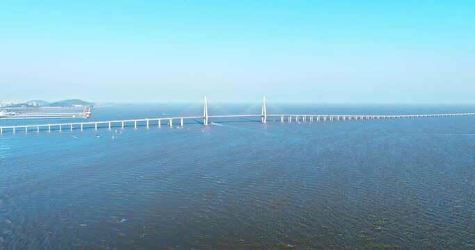 Aerial view of Hangzhou Bay Bridge scenery in Jiaxing, Zhejiang Province, China. The total length of the bridge is 36 kilometers. The design speed is 100 kilometers per hour. 