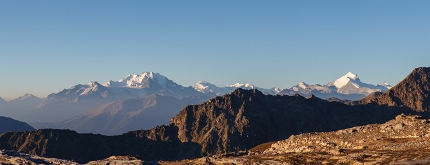 Panoramic shot of the snowy Weisshorn mountains