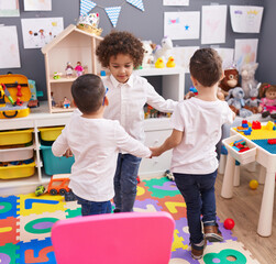 Group of kids students dancing at kindergarten