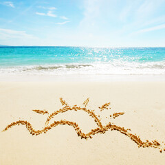 Sun drawing on a beach
