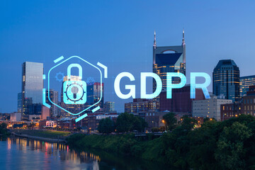 Panoramic view of Broadway district of Nashville over Cumberland River at illuminated night skyline, Tennessee, USA. GDPR hologram, concept of data protection regulation and privacy for individuals