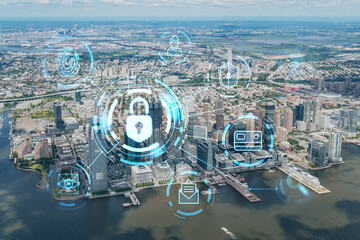 Obraz na płótnie Canvas Aerial panoramic helicopter city view of New Jersey City financial Downtown skyscrapers. The concept of cyber security to protect confidential information, padlock hologram