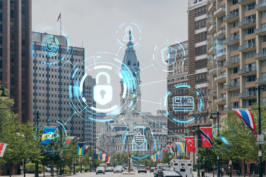Day time cityscape of Philadelphia financial downtown, Pennsylvania, USA. City Hall neighborhood. Glowing Padlock hologram. The concept of cyber security to protect companies confidential information
