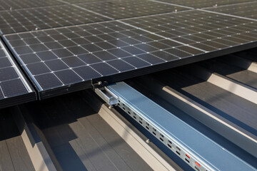 Mounted on the roof of the building solar panels for trapezoidal sheet metal.