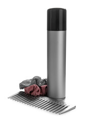 Bottle of hair spray, comb and scrunchies on white background