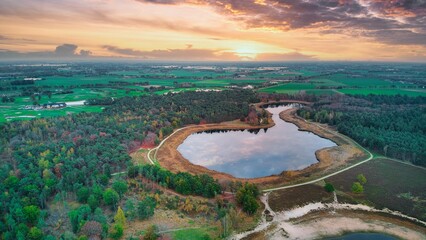 Aerial shot over a blue lake in the netherlands