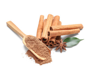 Scoop of powder with cinnamon sticks, anise and leaf on white background