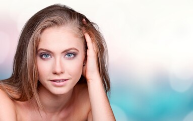 Fototapeta premium Portrait of beautiful young woman with perfect skin