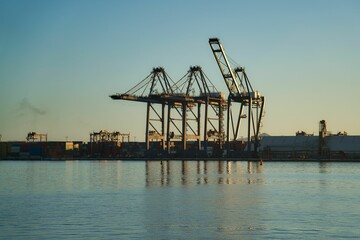 Obraz na płótnie Canvas Gantry cranes near a port harbor